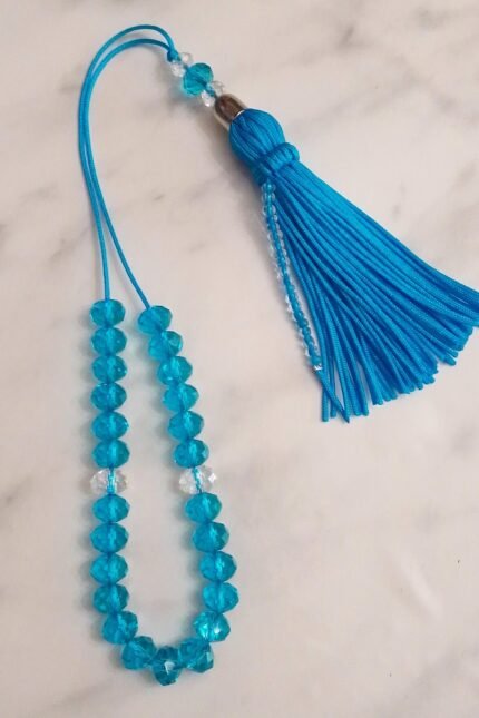 Κομπολόι γυναικείο διάφανα κρύσταλλα τυρκουάζ φούντα 28εκατοστά