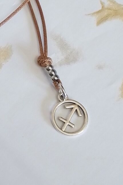 Αντρικό μενταγιόν καφέ ζώδιο Τοξότης μεταλλικό