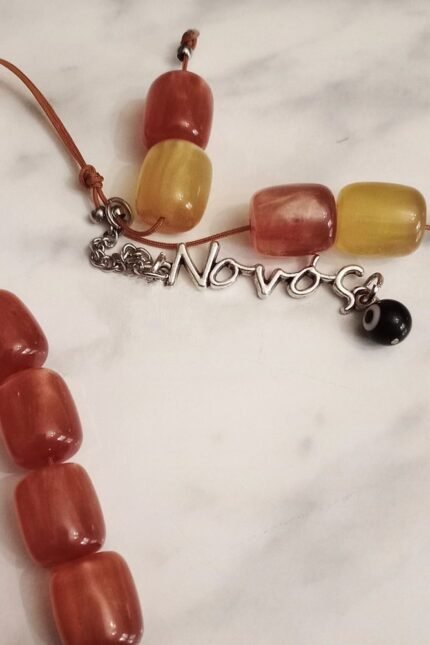 Κομπολόι πορτοκαλί-μπεζ με όνομα Νονός