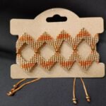 Μακραμέ βραχιόλι χεριού ζικ ζακ πορτοκαλί μπέζ