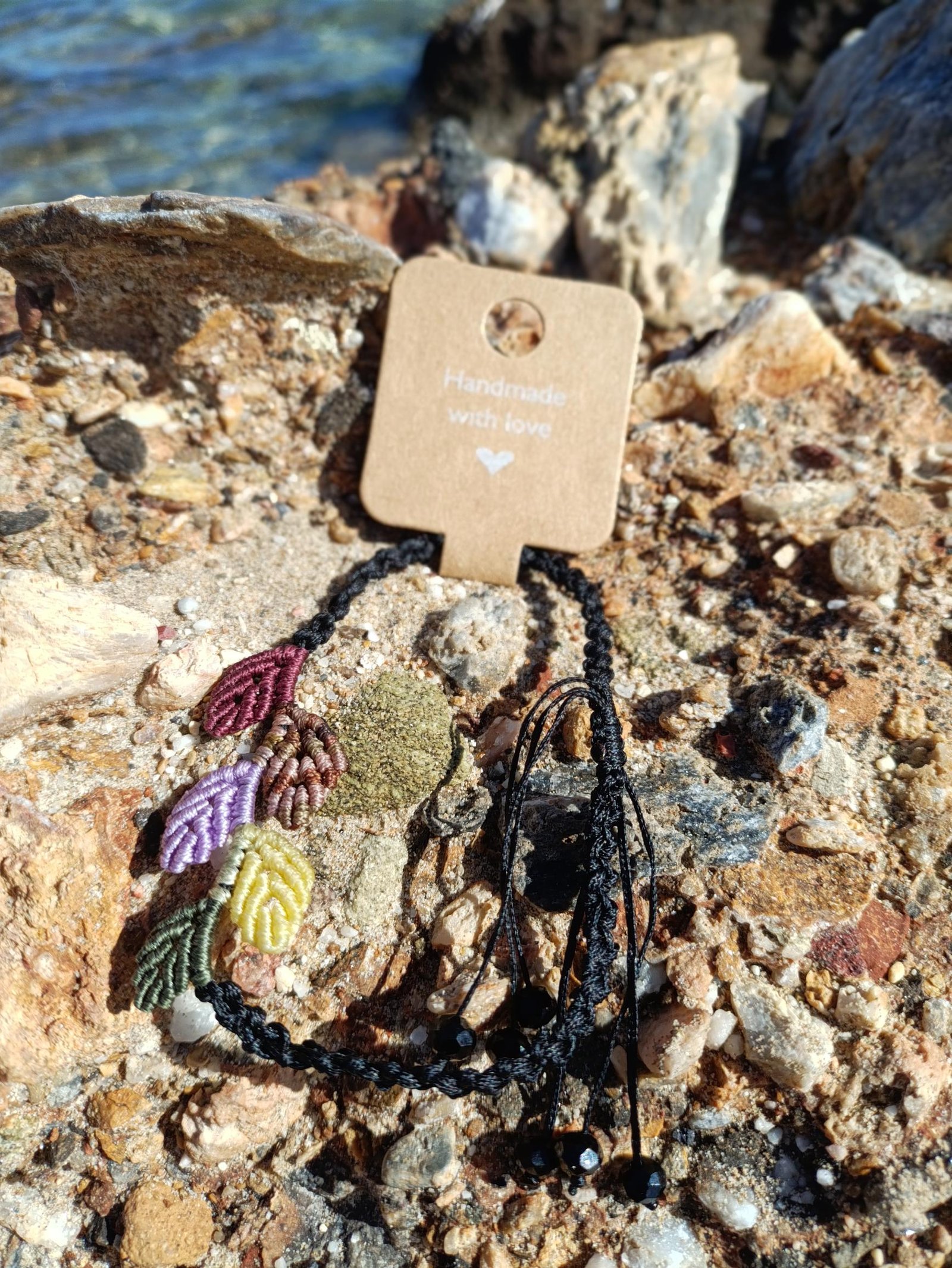 IMG_20251025_120836 Μακραμέ βραχιόλι ποδιού μαύρο με φύλλα χρωματιστά - Image 1