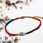 Βραχιόλι - γούρι 26 πορτοκαλί – μπλε “Energy & Flow”