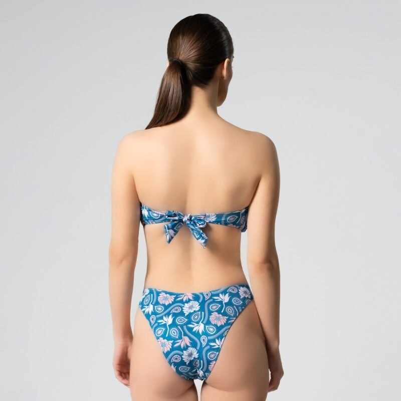 Bandeau with removable padding Adjustable back tie closure  Gold ring detail  Bottom- High cut leg Mid-rise  Cheeky coverage 