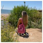 Big round pink bag with pon pon