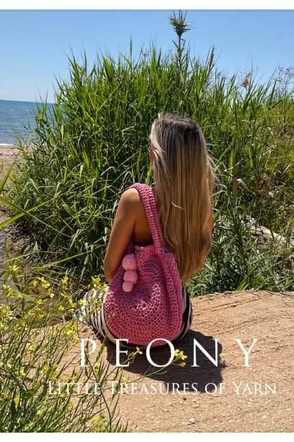 Big round pink bag with pon pon